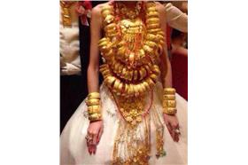 戴70個黃金手鐲出嫁　陸再現超級土豪婚禮　　翻攝自網易