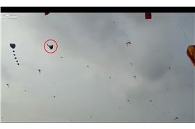 男孩遭風箏纏腳，飛至6層樓高天空。（圖／翻攝自youtube）