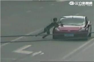 男為「假車禍真詐財」　搏命飛身撞車