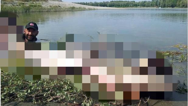媽媽咪呀！男子在河邊捕獲百斤巨獸