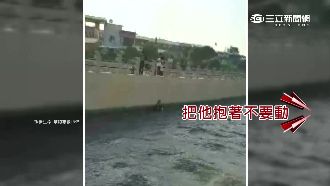 影／吵架後妻跳河尋短　夫跟跳搶救