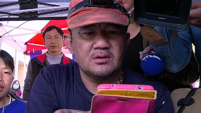 父拿照片急尋兒：救出來了嗎？
