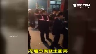 花壇上百人互嗆　警方鳴槍警告反遭嗆