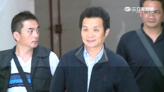 竹崎鄉長疑買兇殺警　到案燦笑不尋常