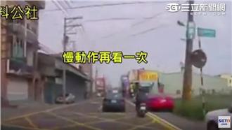 影／為假車禍玩命？騎士自撞轎車倒地