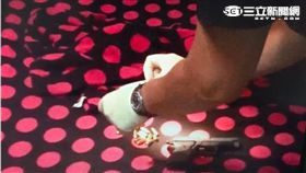 警方在邱男友人住處起獲作案用制式手槍1把、子彈13發。翻攝畫面