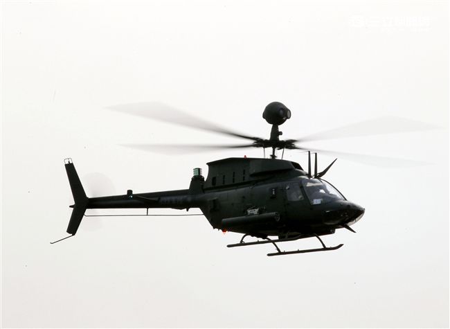 陸軍航特部OH-58D戰搜直升機搭配阿帕契直升機的「獵殺組合」，AHIP負責鎖定目標，阿帕契則從訊號得到目標發射飛彈，摧毀目標。。（記者邱榮吉/攝影）