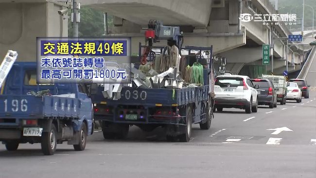 拖吊車想違規左轉　義交霸氣肉身擋車