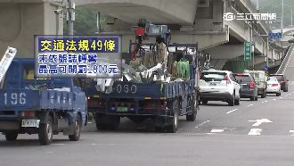 拖吊車想違規左轉　義交霸氣肉身擋車