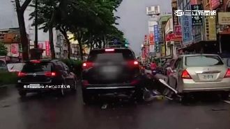 閃違停併排車　休旅車撞女騎士險輾過