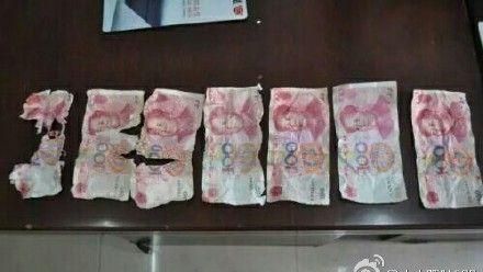 6旬婦換假鈔　被抓竟「吞錢」滅證