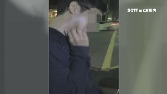 對警過敏？男載毒闖紅燈被攔查猛抓頭