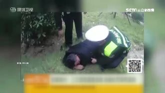 酒駕倒地裝死　陸男「偷瞄」被警發現
