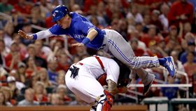 Chris Coghlan飛越捕手。（圖／美聯社／達志影像）