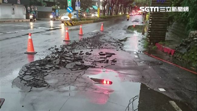 豪大雨釀災　淡水道路隆起破裂