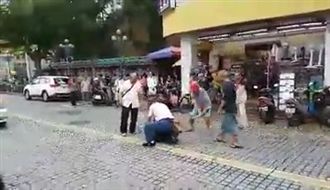 不滿打女人　2街友當街教訓光頭男