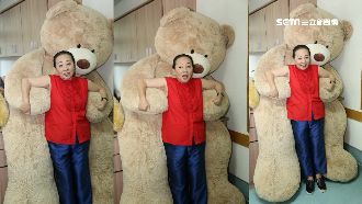 張花冠臉書po熊抱照：我單身弱女子