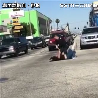 女子酒醉大鬧街口！ 被警棍毆不讓步