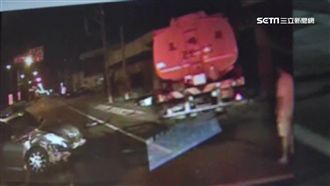 酒駕轎車擦撞　油罐車失控衝進廠房