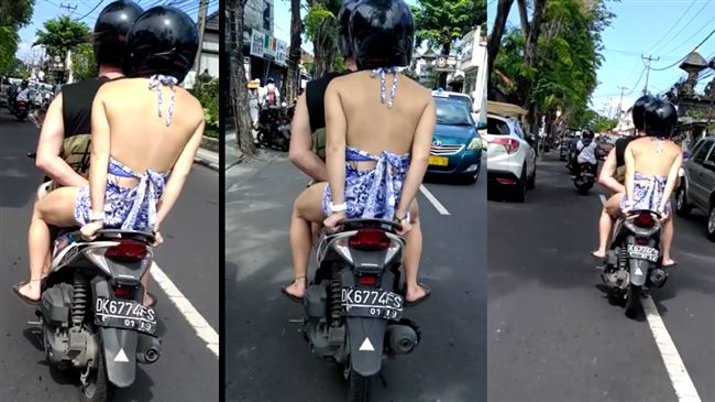 男騎車單手催油門　左手進攻女友下面