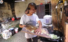 「墨魚頭男孩」池周晶（圖翻攝《海峽都市報》）