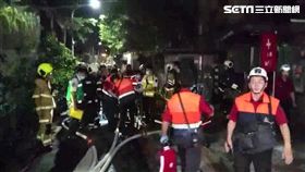 吳男疑因幻聽發作，憤而丟擲電腦螢幕至樓下洩憤，還持噴槍燒毀家具，警消獲報趕抵現場，迅速撲滅火勢，並救出嗆傷的吳男與吳姓前妻（翻攝畫面）