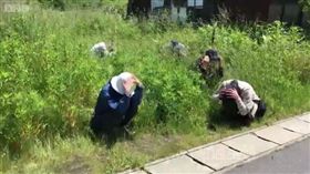 擔心北韓導彈來襲，日本民眾進行多次空襲演練。（圖／翻攝自BBC中文網）