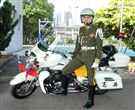 憲兵機車排展示勤務服裝、防護服裝、重型機車。（記者邱榮吉/攝影）