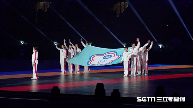 選手不能持國旗　學者：五星旗就可？