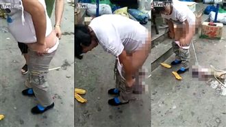 女子當街脫褲　下秒嬰兒從胯下滑落