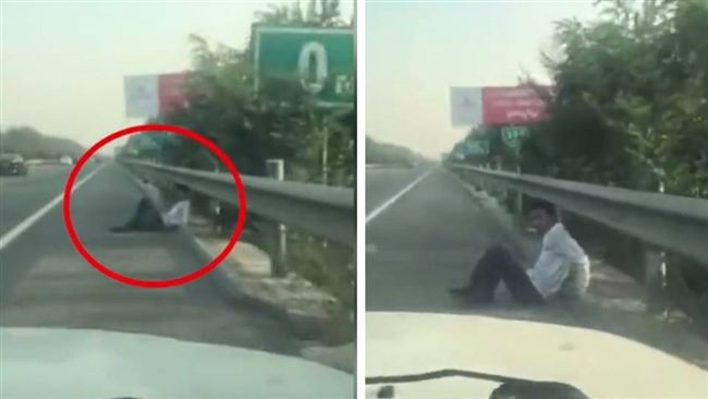 想要歇一會…男子翹腳躺高速公路路肩