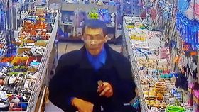 男子竊走無線電話後離去。（圖／翻攝畫面）