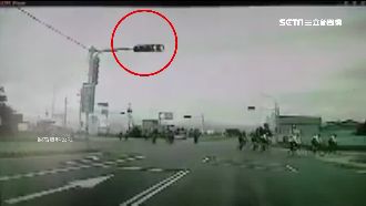 單車「一日雙塔」沒交管　集體闖紅燈