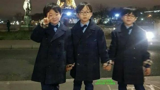 三胞胎現身法國　暴風抽高變身小紳士