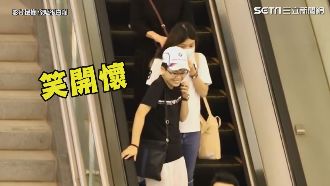 拿熨斗講電話　路人笑到語無倫次