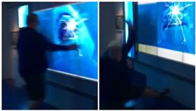 美國華盛頓國際間諜博物館展出「互動式水族館」，鯊魚衝破玻璃嚇壞民眾。（圖／翻攝自YouTube）