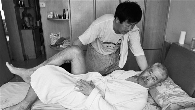 日行30里滿腳繭　孝子無悔伴父9年