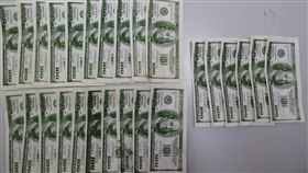 女拿美鈔到銀行兌換，行員發現是冥紙。（圖／翻攝畫面）