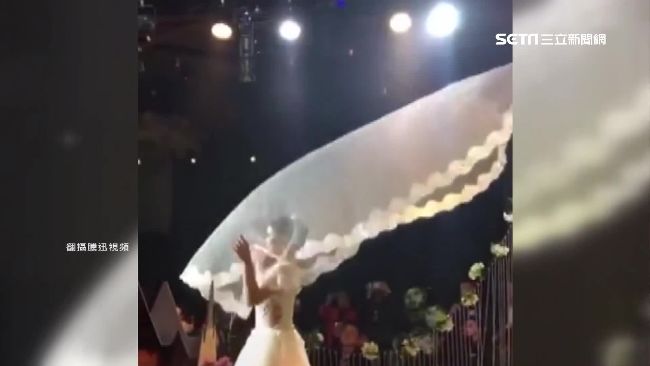 陸婚禮搞噱頭！「飛天頭紗」從天而降