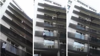 4歲童掛4樓外　「蜘蛛人」攀牆救人