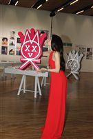 莫文蔚一身火紅褲裝出席「我們在中場相遇」新歌搶聽會。（記者邱榮吉/攝影）