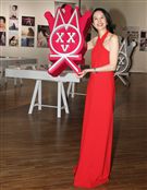 莫文蔚一身火紅褲裝出席「我們在中場相遇」新歌搶聽會。（記者邱榮吉/攝影）