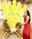 莫文蔚一身火紅褲裝出席「我們在中場相遇」新歌搶聽會。（記者邱榮吉/攝影）