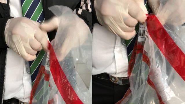 手提密封免稅品　保全「硬拆」全丟掉