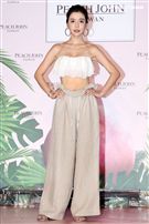 李毓芬休閒辣曬比基尼曲線，演繹夏日海灘度假造型。（記者邱榮吉/攝影）