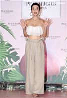 李毓芬休閒辣曬比基尼曲線，演繹夏日海灘度假造型。（記者邱榮吉/攝影）