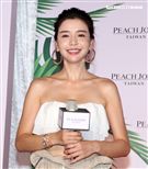 李毓芬休閒辣曬比基尼曲線，演繹夏日海灘度假造型。（記者邱榮吉/攝影）