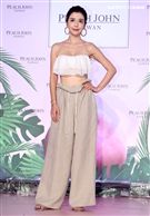 李毓芬休閒辣曬比基尼曲線，演繹夏日海灘度假造型。（記者邱榮吉/攝影）