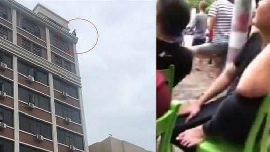輕生男3小時不跳樓　群眾搬椅子坐等