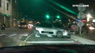 酒駕拒捕猛衝撞拖行員警　遭開槍制止